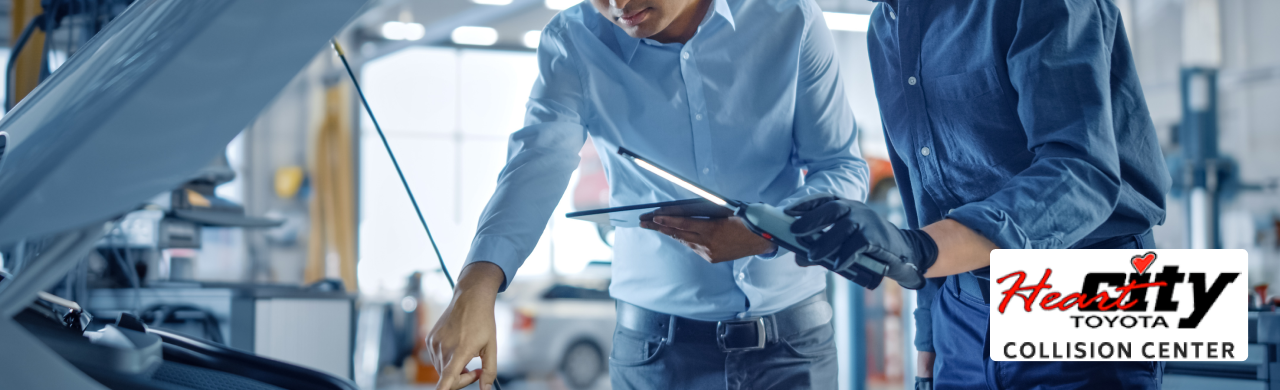Technician performing auto collision repair in Elkhart at Heart City Toyota Collision Center