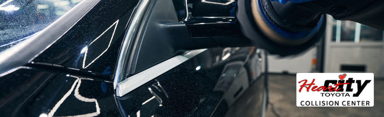A technician is repairing a damaged side mirror at Heart City Toyota Collision Center in Elkhart, IN.